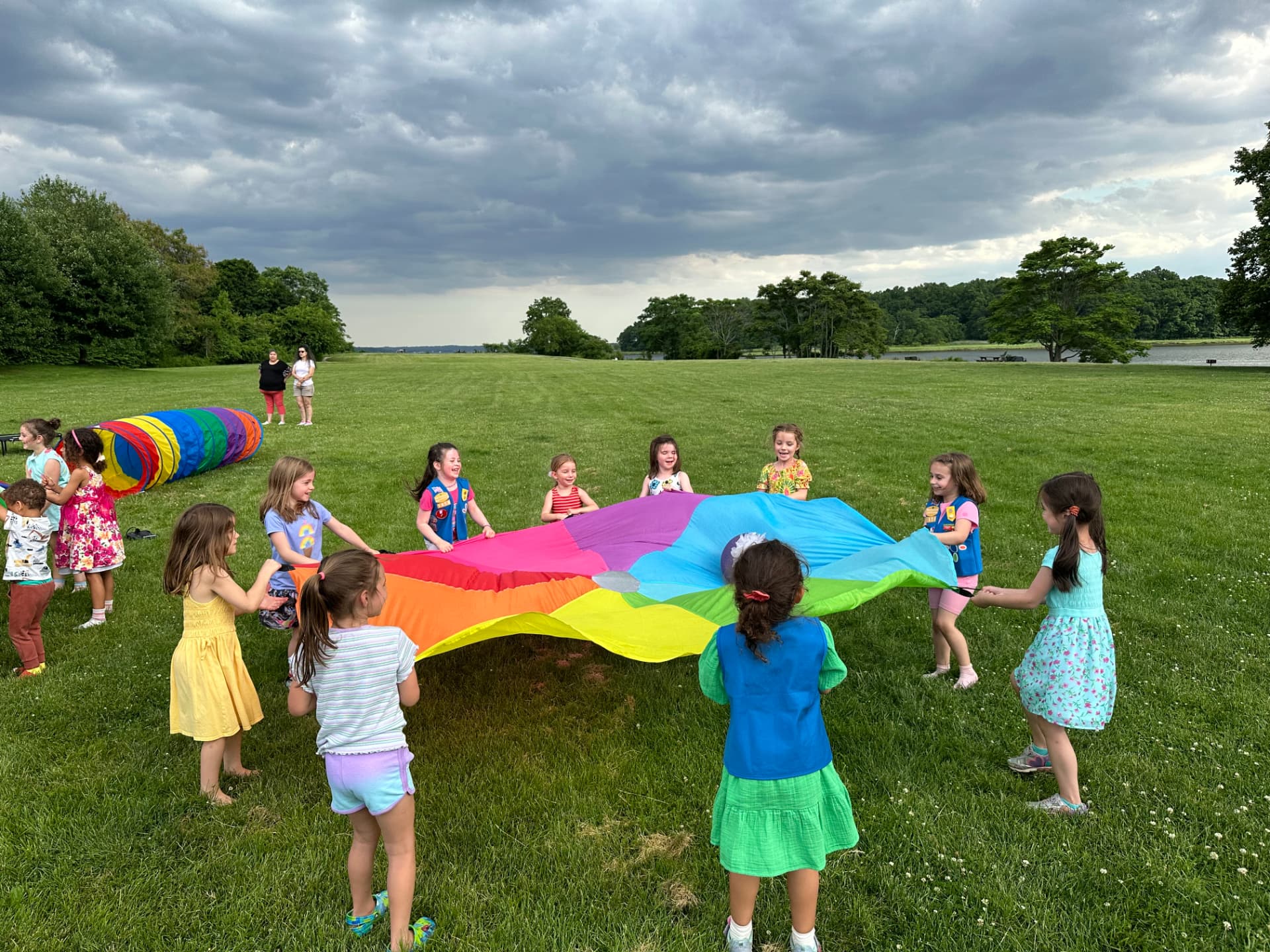 Toddlers dancing with colorful ribbons and instruments